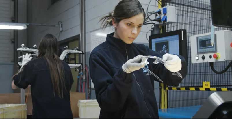 Woman creating a robot