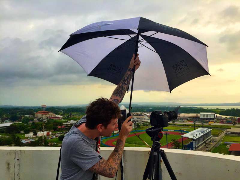 
A man protects the camera when filming